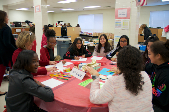 Photo of girls at table during She's Creative session