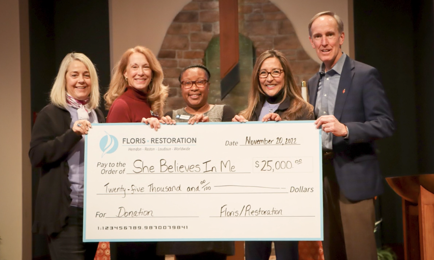 photo of $25k donation to SBIM from FUMC church